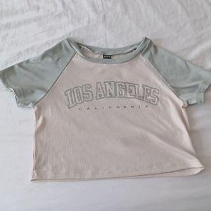 Cropped Los Angeles t shirt light green and cream color size M from shein